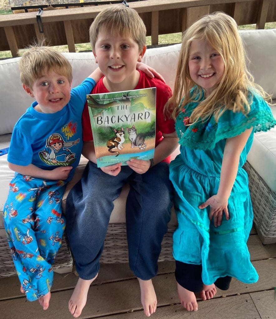 A group of children sitting on a couch.