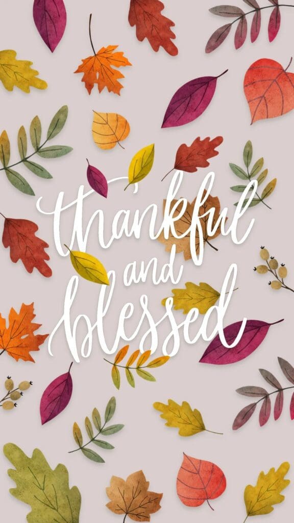 Thanksgiving card with colorful leaves and the words thankful and blessed.