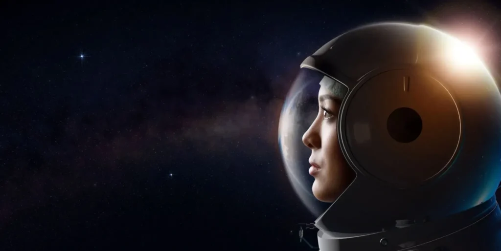 Astronaut gazing into space with helmet.