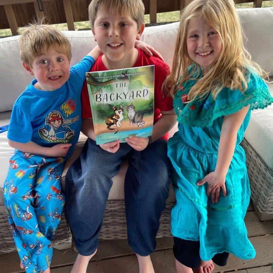 A group of children sitting on a couch.