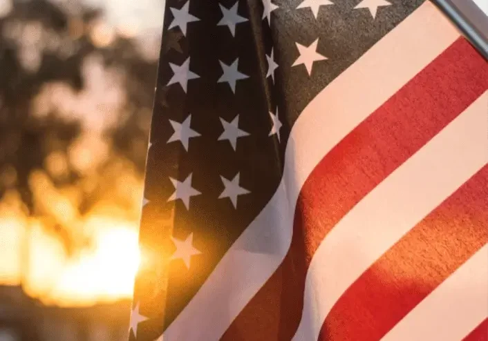 An american flag with the words happy independence day.